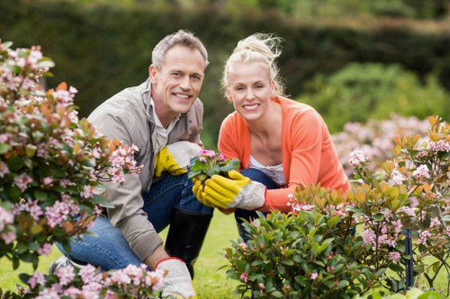 Local team clearing green waste and garden debris in Thamesmead
